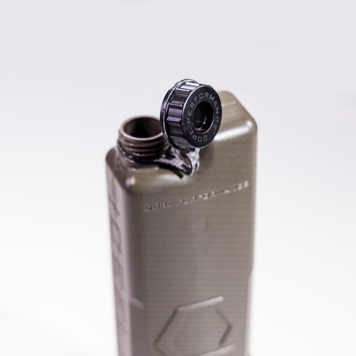 Side profile of Closed Cap with tether loop attached