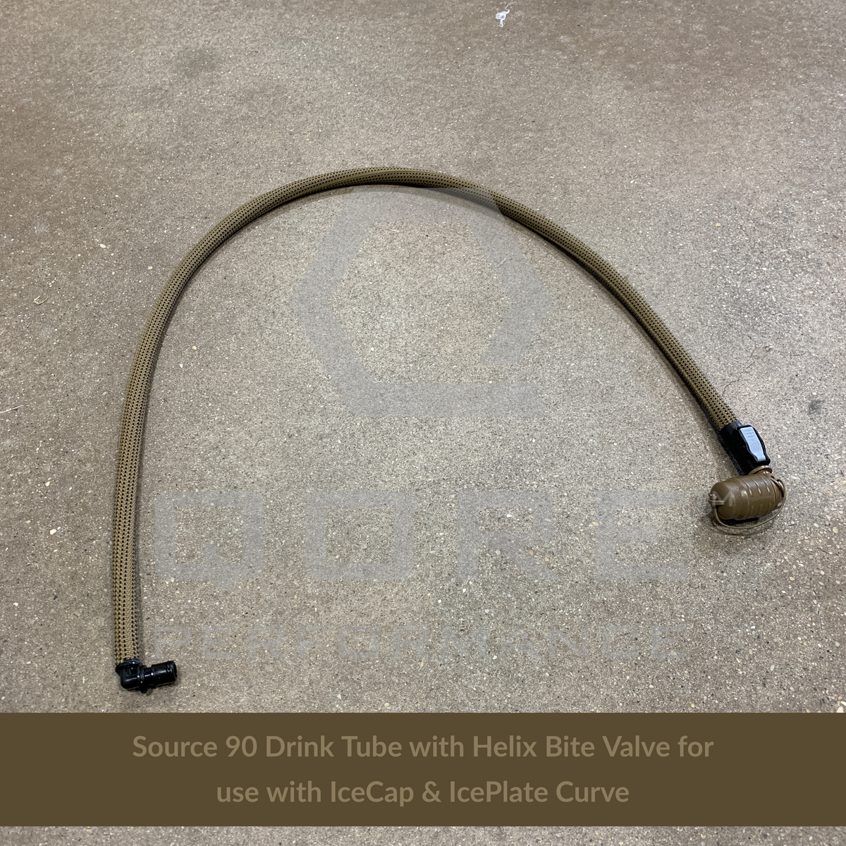 Full product view of Source 90 Drink Tube with Helix Bite Valve, pictured on concrete surface